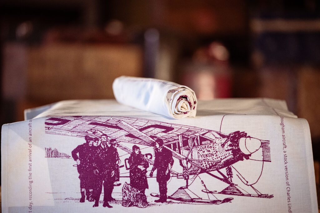 Queen of the Yukon Purple Tea Towel - Image 2