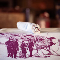 Queen of the Yukon Purple Tea Towel - Image 2
